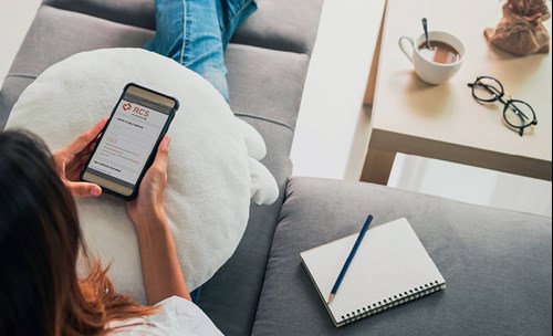 Woman using RCS Mobile App
